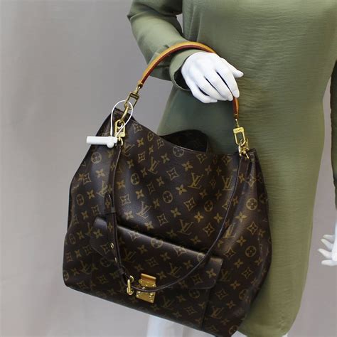 louis vuitton monogram canvas pochette metis|louis vuitton metis hobo monogram.